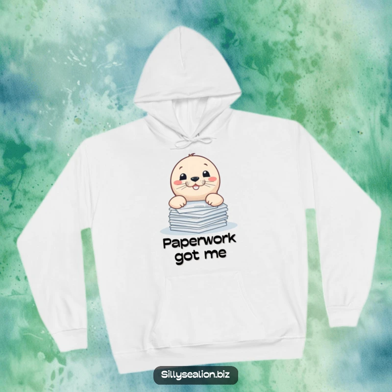 Funny sea lion hoodie, playfully peeking over a stack of papers with a wide, happy grin.