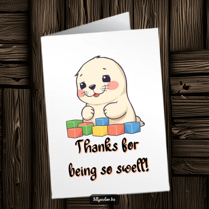 Funny Free Printable Thank You Card: A sweet sea lion pup intently sorting colorful blocks, a charming way to say thanks.