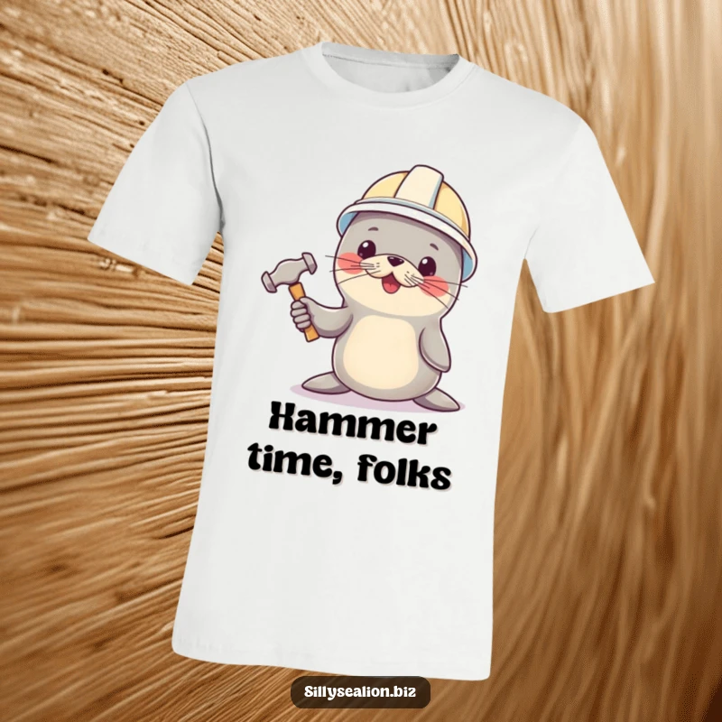 Funny sea lion t-shirt, wearing a hard hat, holding a tiny hammer, celebrating hard work and humor.