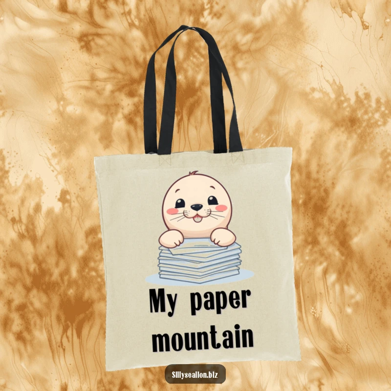 Funny sea lion tote bag, playfully peeking over a stack of papers with a mischievous grin.